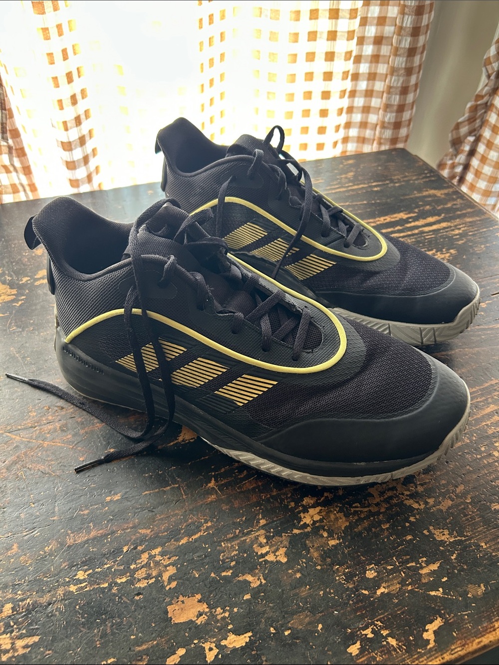 Adidas Black Athletic Sneakers with Yellow Trim